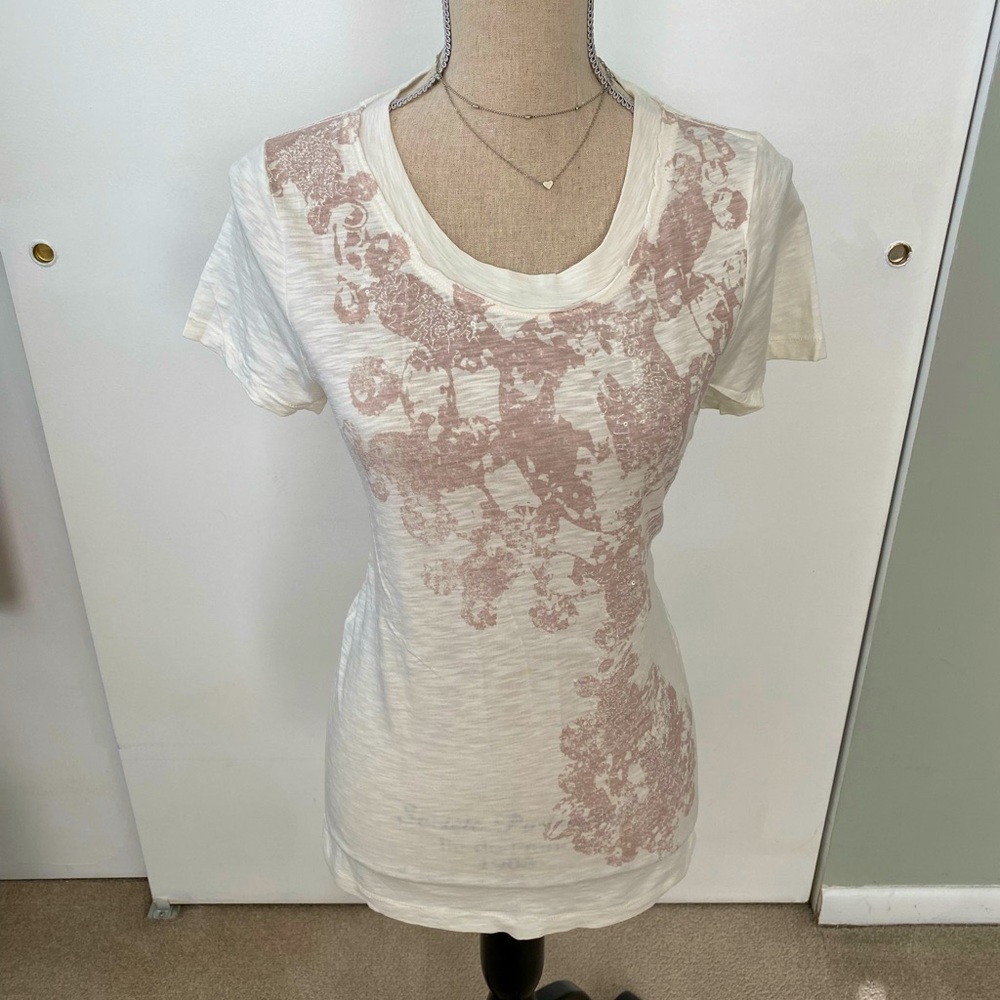 JCrew tee.  Soft cotton, feels great against your skin. Dress it up or down.